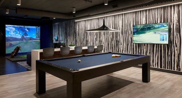 game room with light hardwood / wood-style floors and billiards