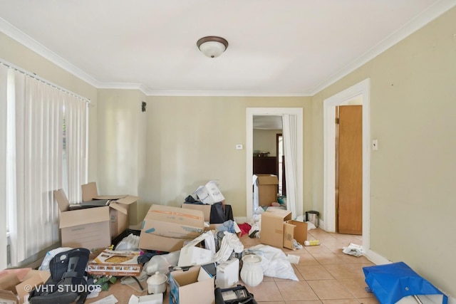 interior space featuring ornamental molding and light tile patterned floors