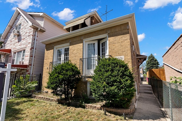 view of front of house featuring cooling unit