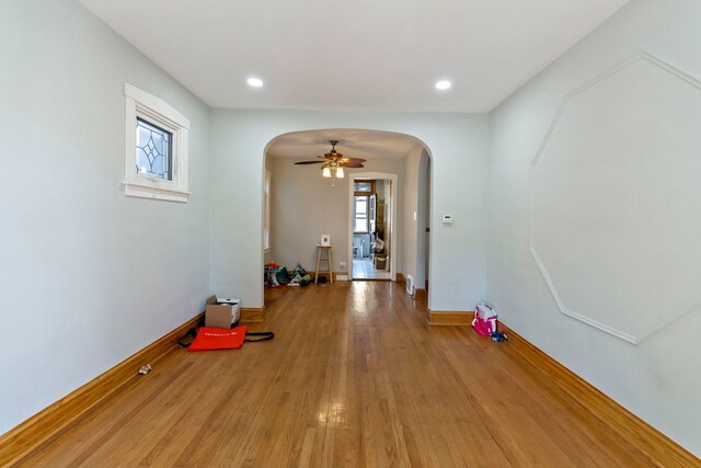 foyer featuring ceiling fan and light hardwood / wood-style floors