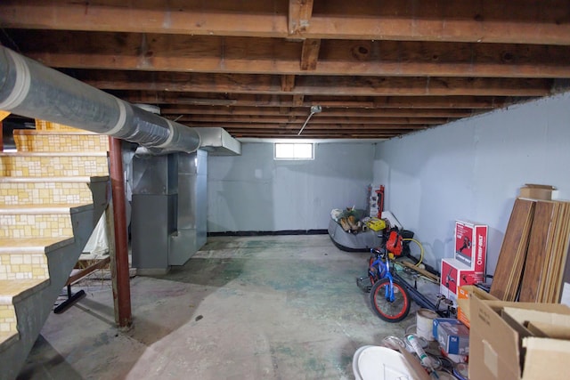 basement featuring heating unit