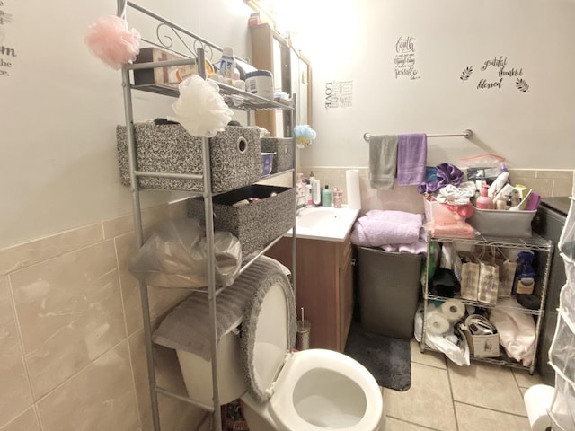 16404 Homan Ave, Markham, IL 60428 - bathroom with wainscoting, vanity, tile patterned flooring, and tile walls