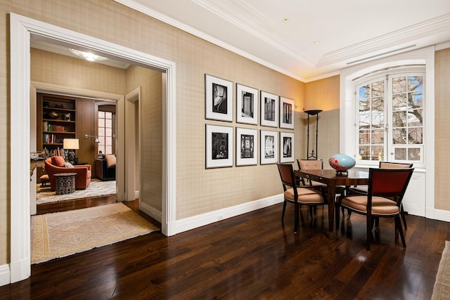 dining area featuring ornamental molding and hardwood / wood-style floors