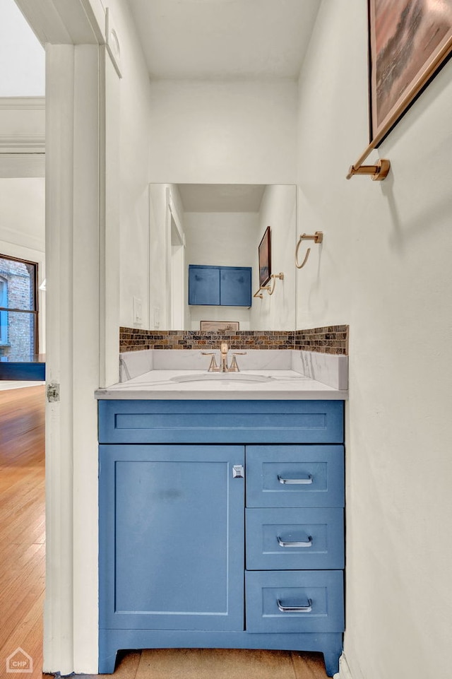 bathroom featuring vanity and hardwood / wood-style flooring