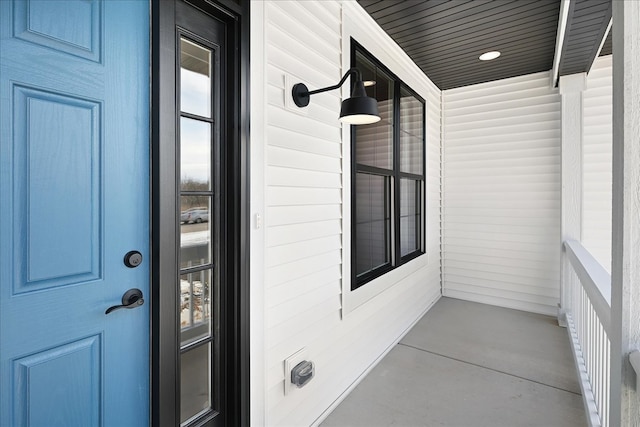 doorway to property featuring a porch