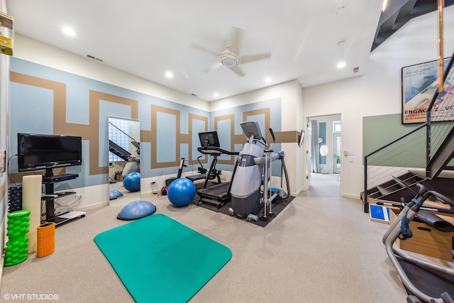 exercise room featuring ceiling fan and a wealth of natural light