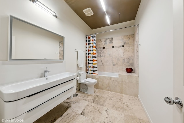 full bathroom featuring vanity, tile patterned floors, toilet, and shower / bath combination with curtain