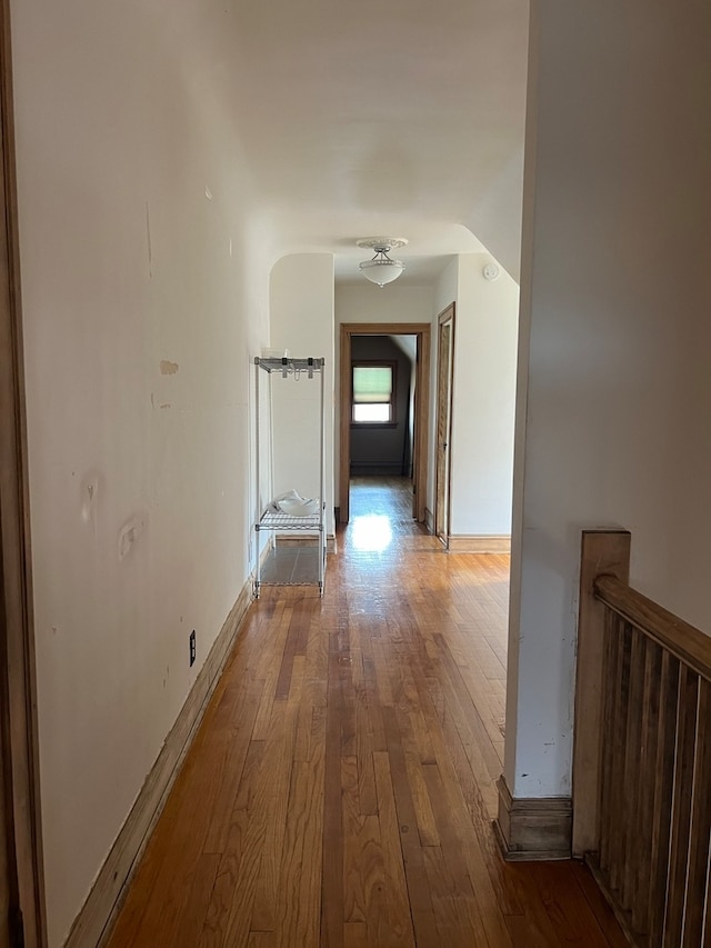 corridor featuring hardwood / wood-style flooring