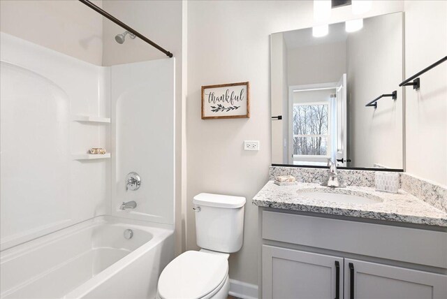 full bathroom with vanity, toilet, and shower / tub combination