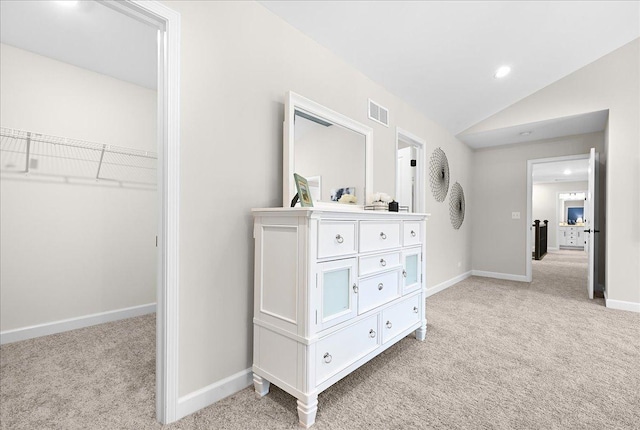 bedroom featuring recessed lighting, visible vents, light carpet, vaulted ceiling, and baseboards