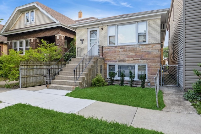 view of front of house with a front lawn