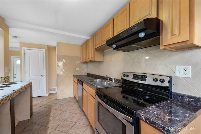 kitchen featuring light tile patterned floors, ventilation hood, appliances with stainless steel finishes, decorative backsplash, and sink