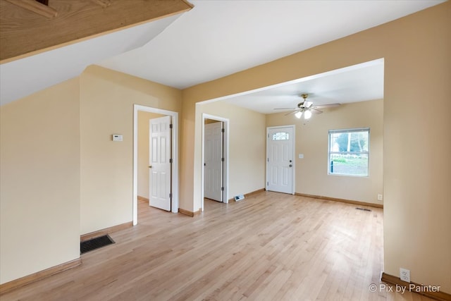 unfurnished room featuring light hardwood / wood-style floors and ceiling fan