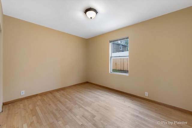 unfurnished room featuring light wood-type flooring