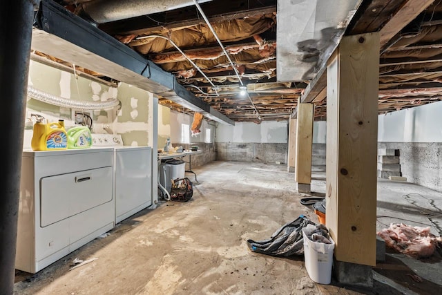 basement featuring separate washer and dryer