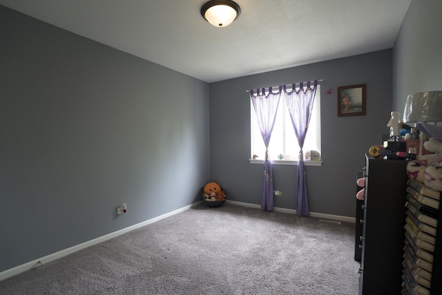 unfurnished room with carpet