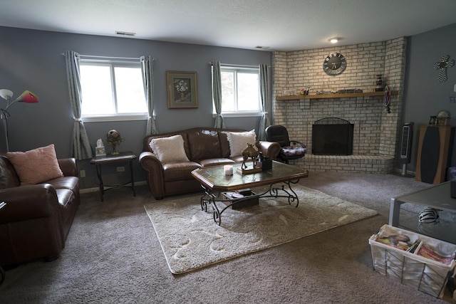 carpeted living room featuring a brick fireplace