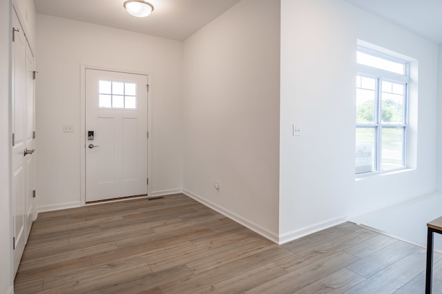 doorway featuring hardwood / wood-style flooring