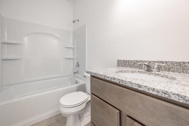 full bathroom with tile patterned flooring, bathtub / shower combination, vanity, and toilet