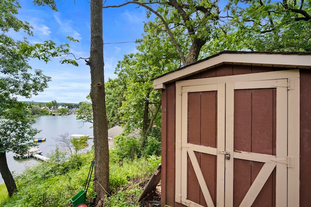 view of shed featuring a water view