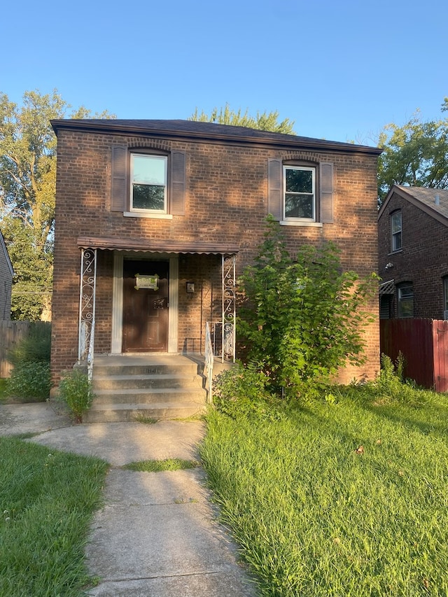 10840 S Buffalo Ave, Chicago, IL 60617 - view of front of house with brick siding and fence