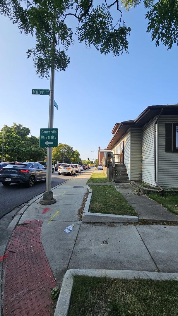 view of street with curbs and sidewalks