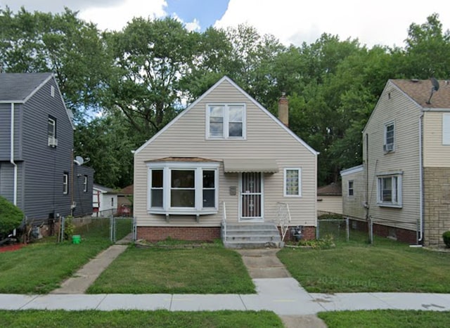 view of front of house featuring a front lawn