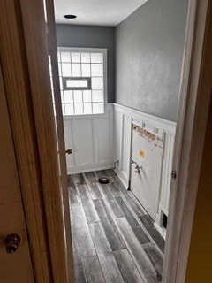 bathroom with wood-type flooring