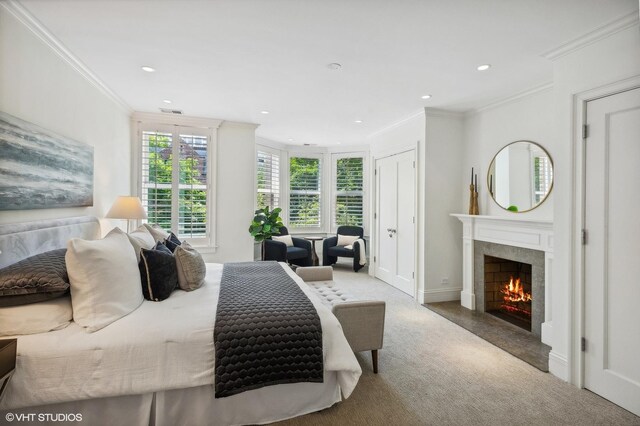 bedroom with carpet and crown molding