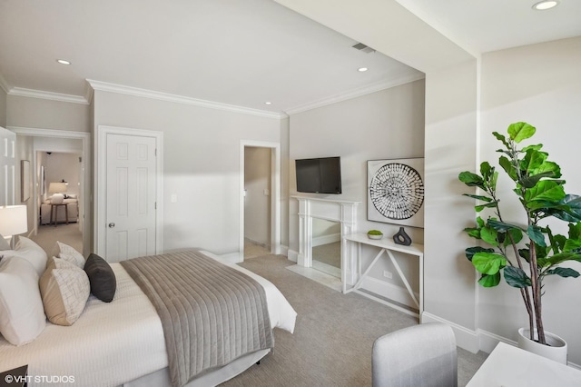 carpeted bedroom featuring ornamental molding