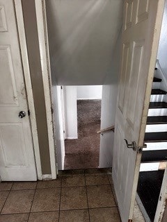 hall featuring tile patterned floors