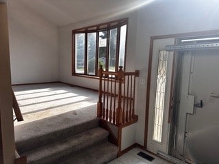 foyer with lofted ceiling