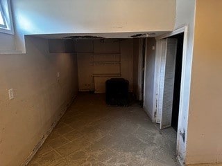 basement featuring tile patterned flooring