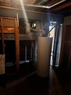 utility room with gas water heater