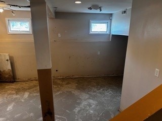 basement featuring tile patterned flooring