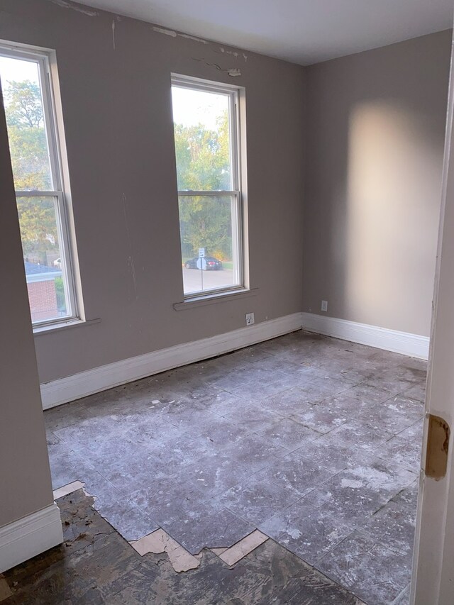 spare room featuring a healthy amount of sunlight