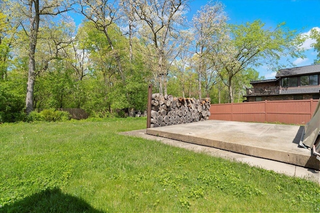 view of yard with a patio area and fence