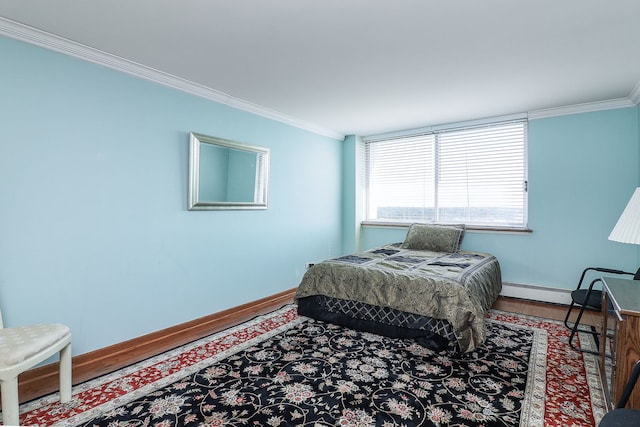 bedroom with a baseboard radiator and crown molding