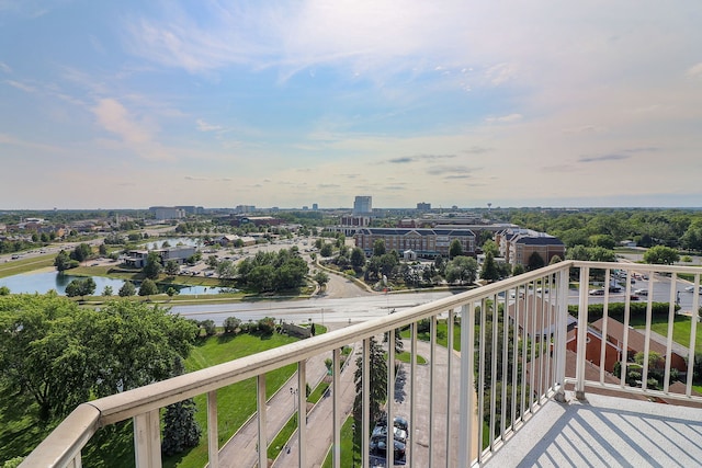 balcony featuring a water view