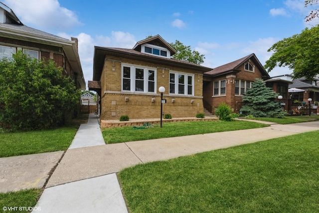 view of front of home featuring a front yard