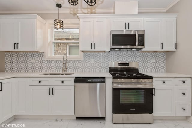 kitchen featuring white cabinetry, sink, and appliances with stainless steel finishes