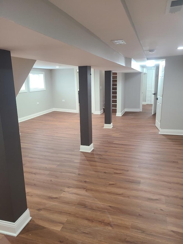 basement with wood-type flooring