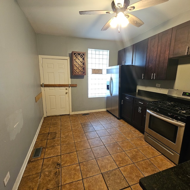 kitchen with light tile patterned floors, appliances with stainless steel finishes, dark brown cabinetry, and ceiling fan