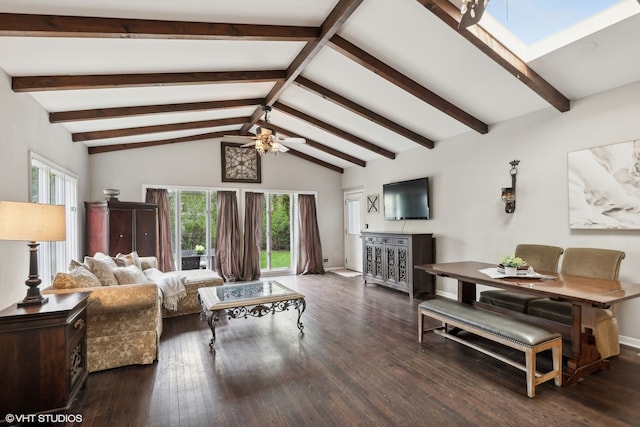 living room with ceiling fan, high vaulted ceiling, a skylight, beam ceiling, and dark hardwood / wood-style floors