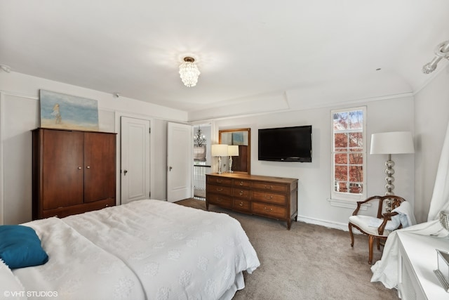 bedroom with carpet and vaulted ceiling