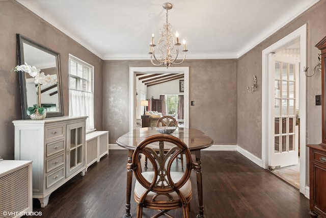 dining area with a notable chandelier, crown molding, and dark hardwood / wood-style floors