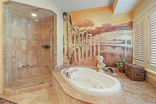 bathroom with shower with separate bathtub