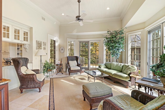 sunroom featuring ceiling fan, plenty of natural light, and wooden ceiling