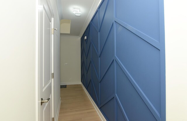 mudroom with light wood-type flooring