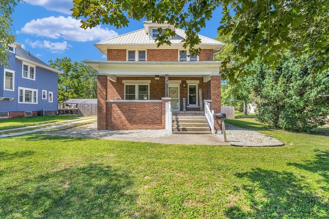 exterior space with a porch and a front lawn